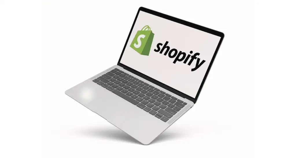 Computer showing shopify logo